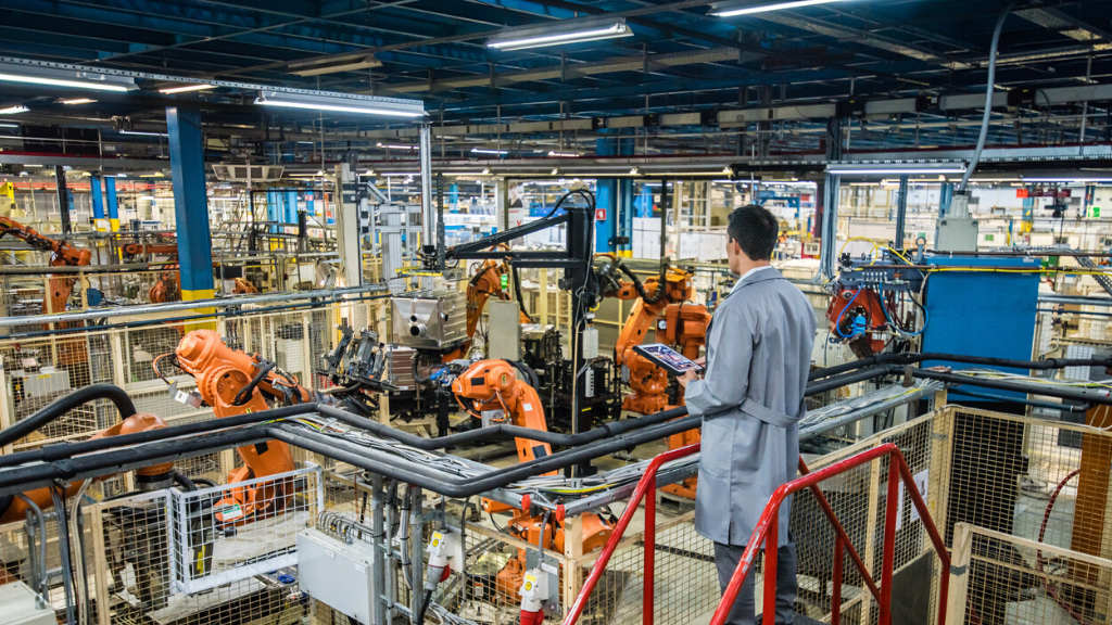 Factory engineer inspecting manufacturing plant